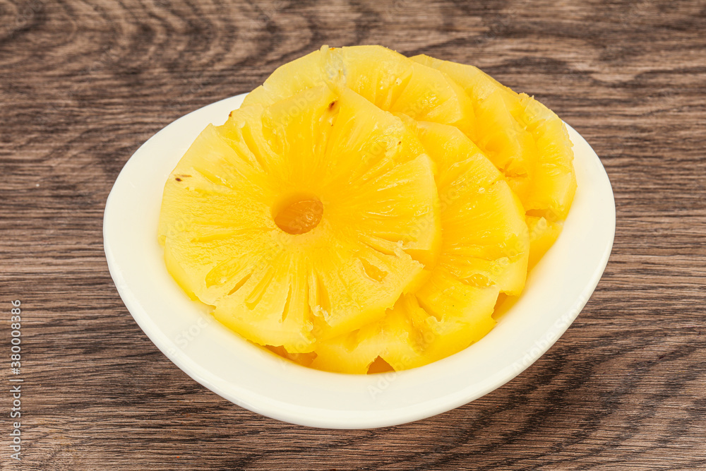 Marinated pineapple rings in the bowl Marinated pineapple rings in the bowl