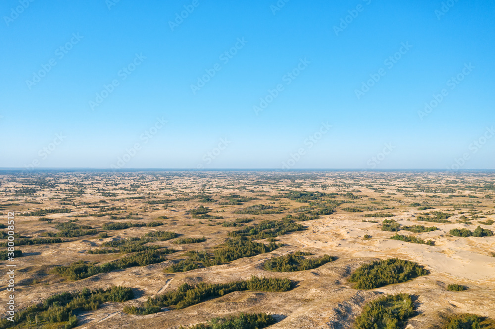 Desert sunset. Beautiful desert with warm colors. Аleshkovskaya desert in Ukraine