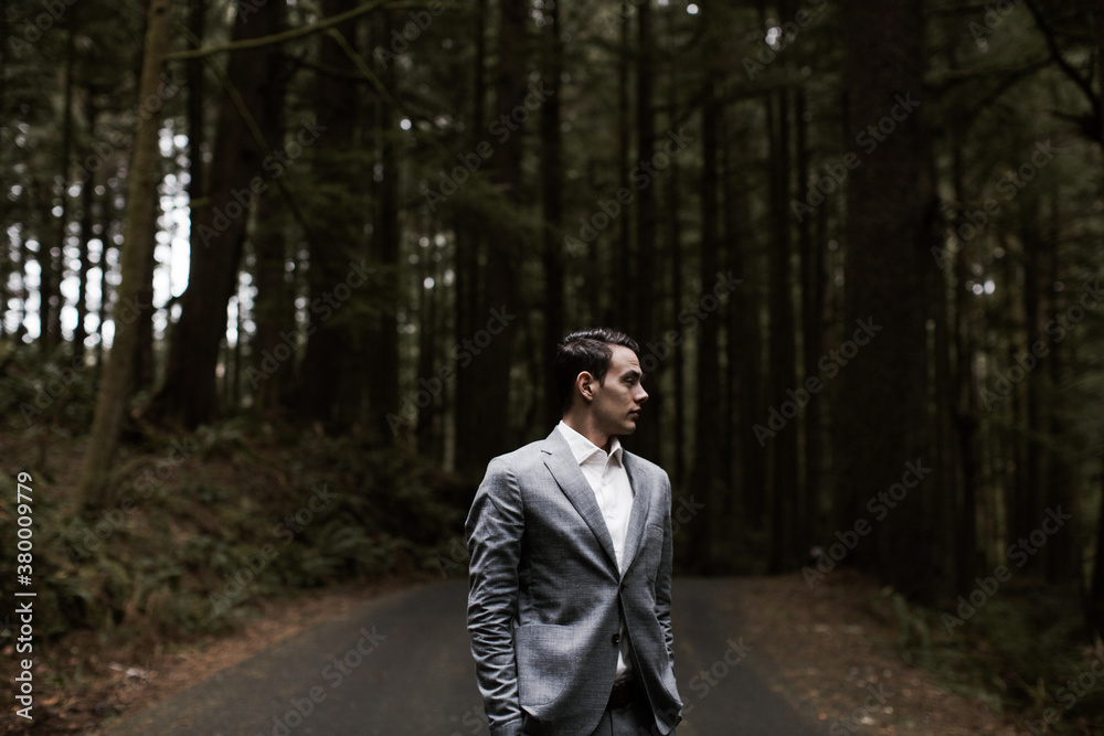Young Man at Coast in Grey Suit Young Man at Coast in Grey Suit