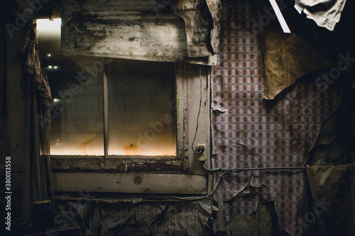 A decaying room in a long-abandoned house