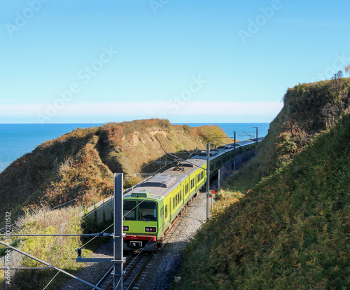 The Irish DART Train passing in Bray, Co.Wicklow, Ireland.
