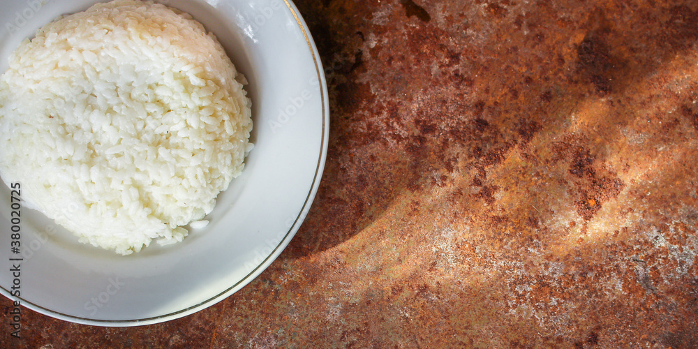 rice in a plate garnish on the table serving size top view place copy space for text keto or paleo diet rice in a plate garnish on the table serving size top view place copy space for text keto or paleo diet