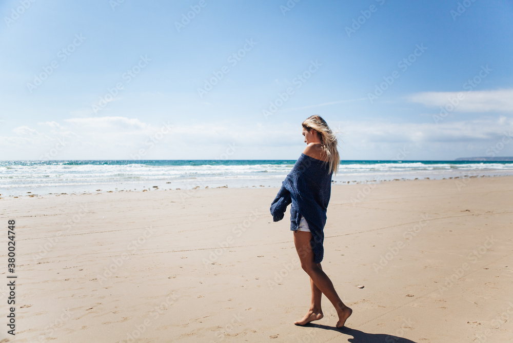Beautiful tatooed woman on the beach in summer Beautiful tatooed woman on the beach in summer