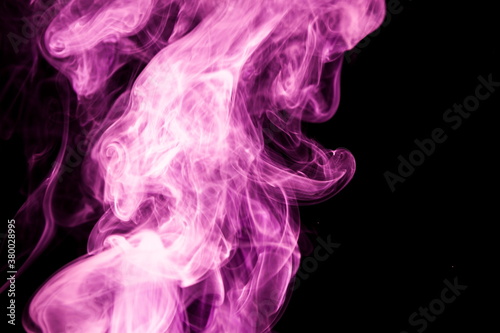 Purple smoke on black background