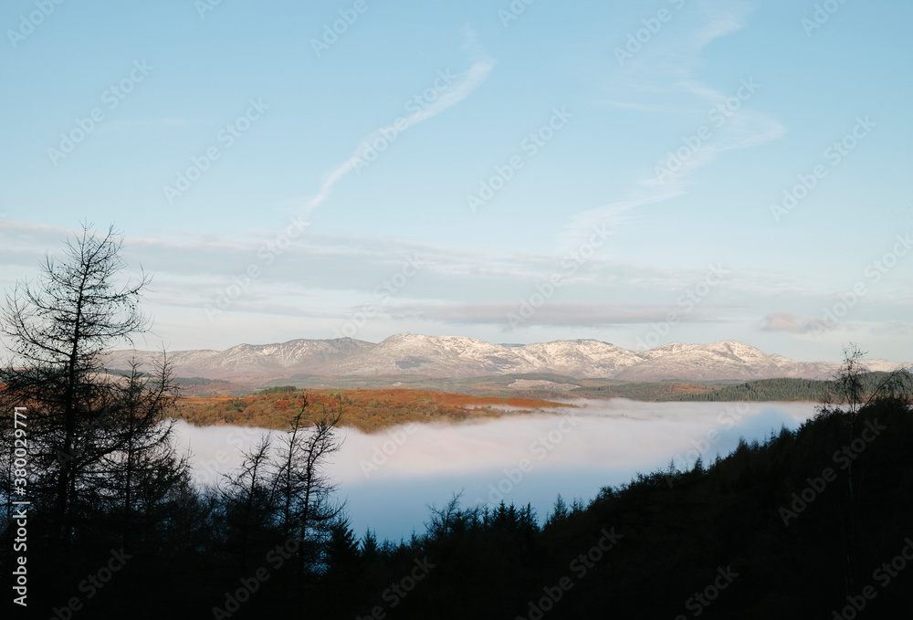 Cloud inversion over Lake Windermere at sunrise. Cumbria, UK. Cloud inversion over Lake Windermere at sunrise. Cumbria, UK.