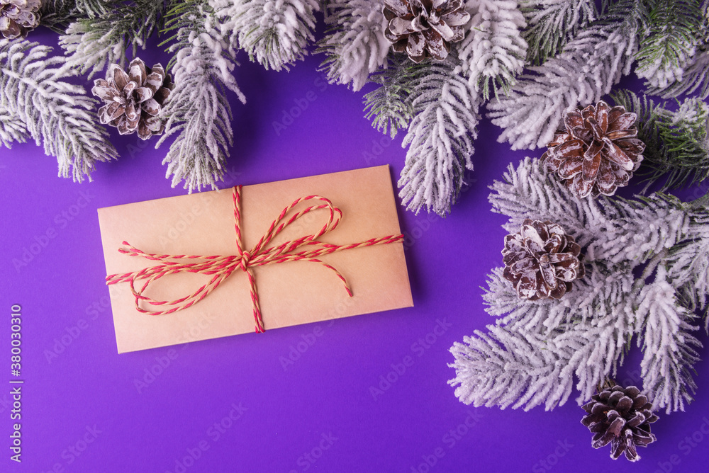 Envelope and frosty Christmas tree branches. New Year concept Envelope and frosty Christmas tree branches. New Year concept