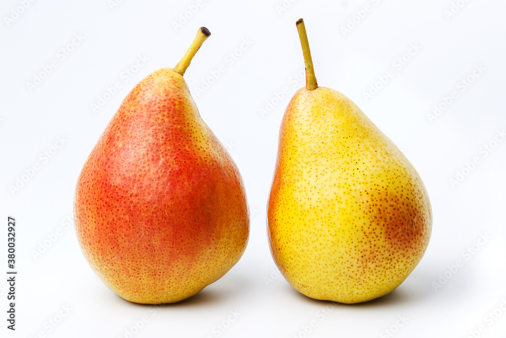 Two trout pears on a white isolated background. Big plan. Two trout pears on a white isolated background. Big plan.