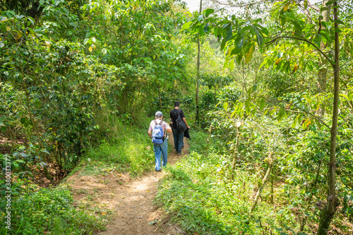 Amaga, Antioquia / Colombia. March 31, 2019. People walking through the countryside in mountainous landscape.