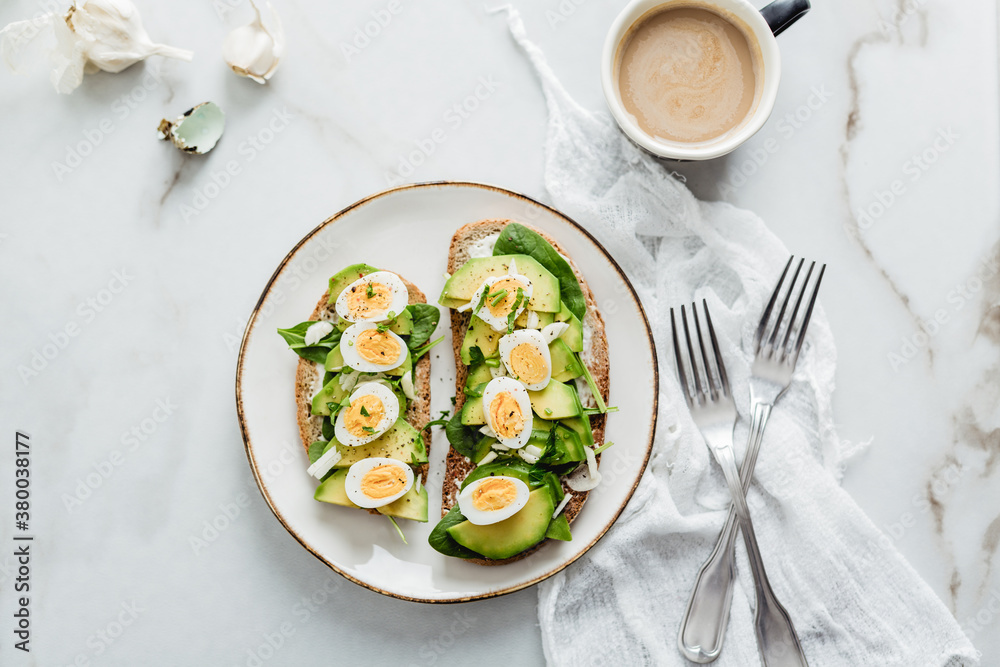 Toast with quail eggs and avocado Toast with quail eggs and avocado