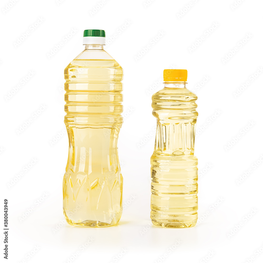 Two bottles of sunflower oil isolated on white background. Yellow