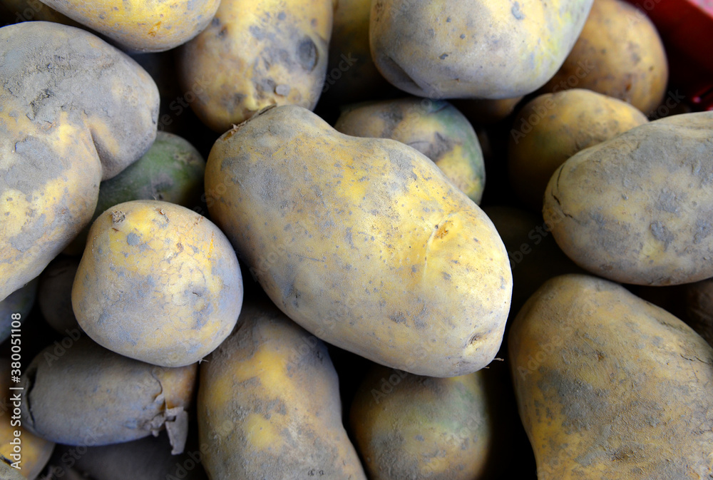 potatoes raw vegetables food for sale at farmers market. Background potatoes raw vegetables food for sale at farmers market. Background