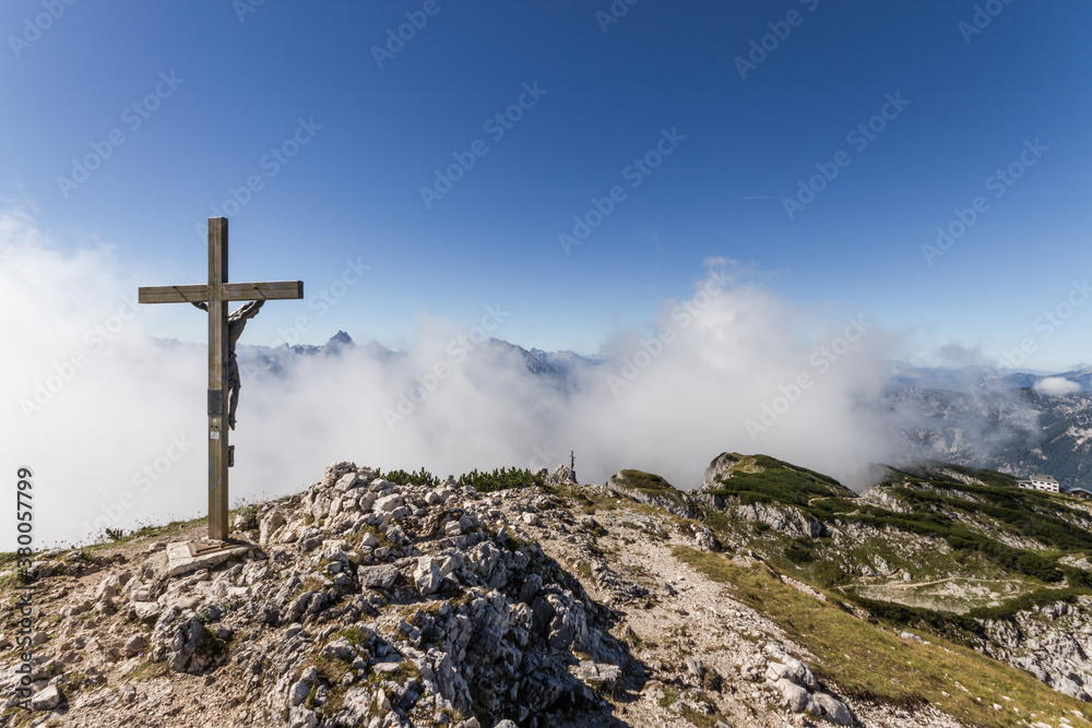 summit cross in alpine landscape summit cross in alpine landscape