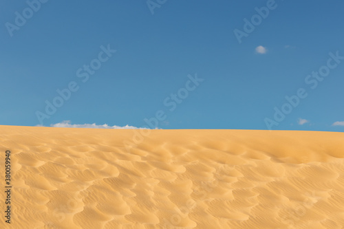 desert sand against blue sky