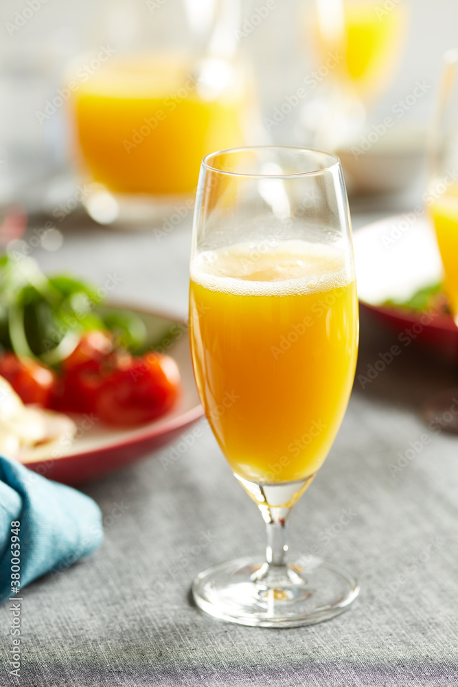 Fresh mimosa cocktail on table. Fresh mimosa cocktail on table.