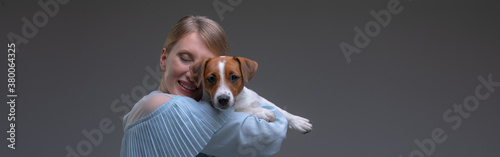 Woman in vintage dress hold jack russell dog