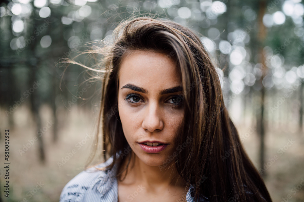 Close up portrait of a beautiful brunette woman Close up portrait of a beautiful brunette woman