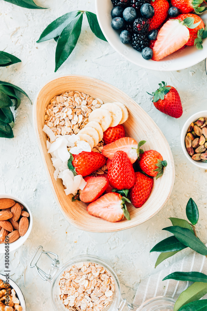 Oats with strawberries, banana and shredded coconut Oats with strawberries, banana and shredded coconut