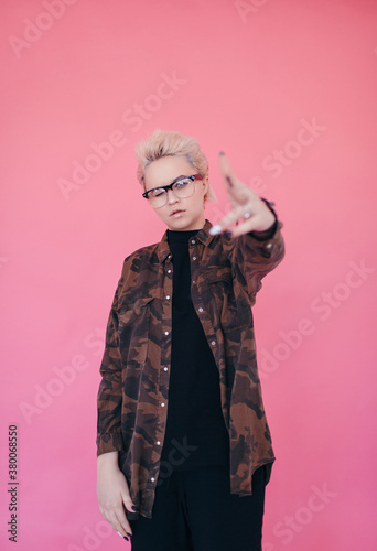 Trendy provocative model on pink background