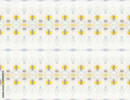 Delicate yellow pattern created by pebbles inside kaleidoscope