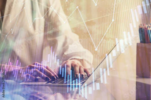 Wallpaper Mural Double exposure of woman hands typing on computer and forex chart hologram drawing. Stock market invest concept. Torontodigital.ca