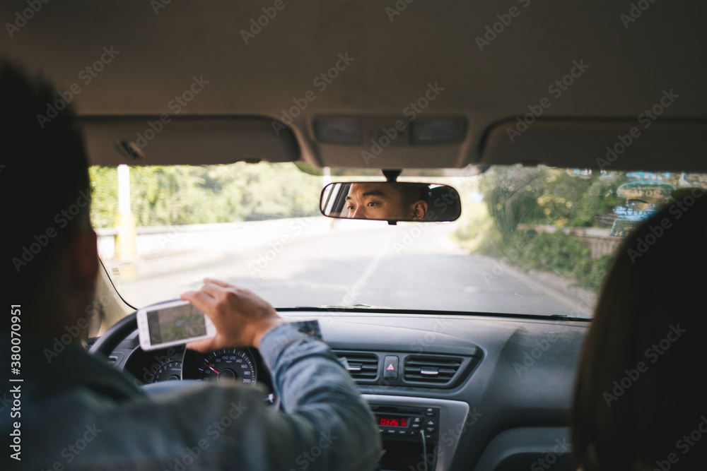 young man is using mobile navigation young man is using mobile navigation