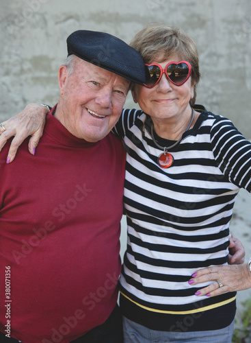 Fun and happy senior citzen married couple photo