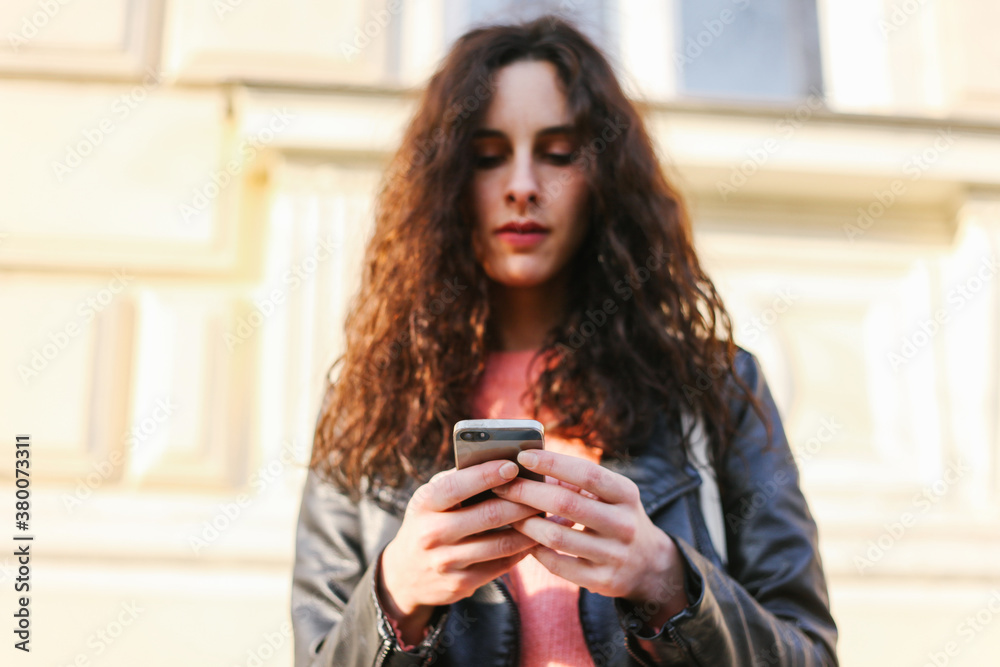 Woman using a mobile phone Woman using a mobile phone