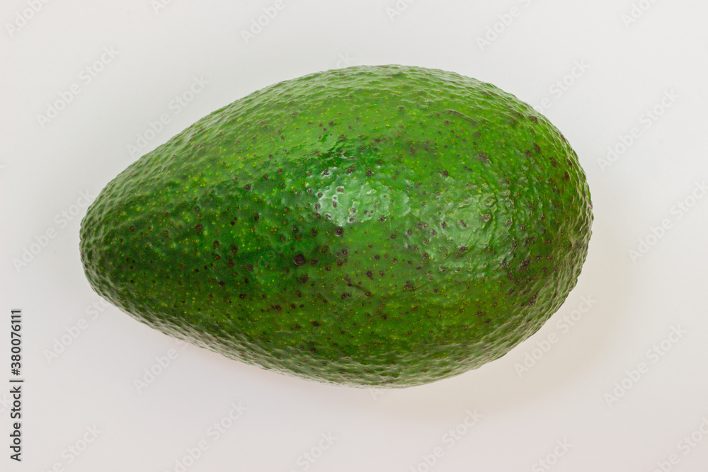 Avocado on a white background. Avocado macro. Close up of an avacado. Avocado isolated on white background. Avocado on a white background. Avocado macro. Close up of an avacado. Avocado isolated on white background.