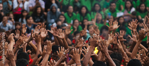 Men's hands during Balinese Kecak Dance photo