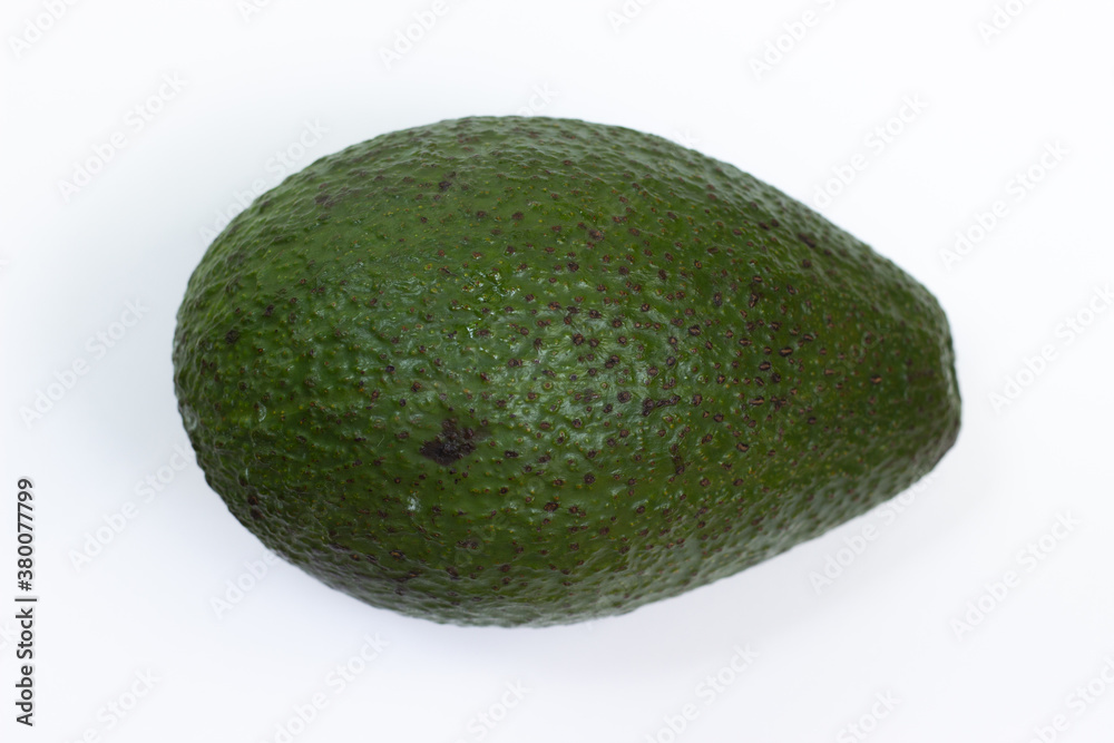 Avocado on a white background. Avocado macro. Close up of an avacado. Avocado isolated on white background. Avocado on a white background. Avocado macro. Close up of an avacado. Avocado isolated on white background.