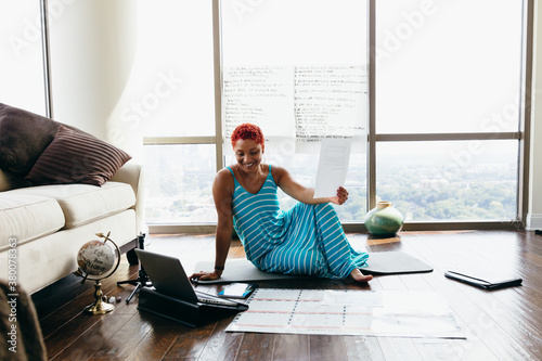 Businesswoman having virtual meeting at home during pandemic