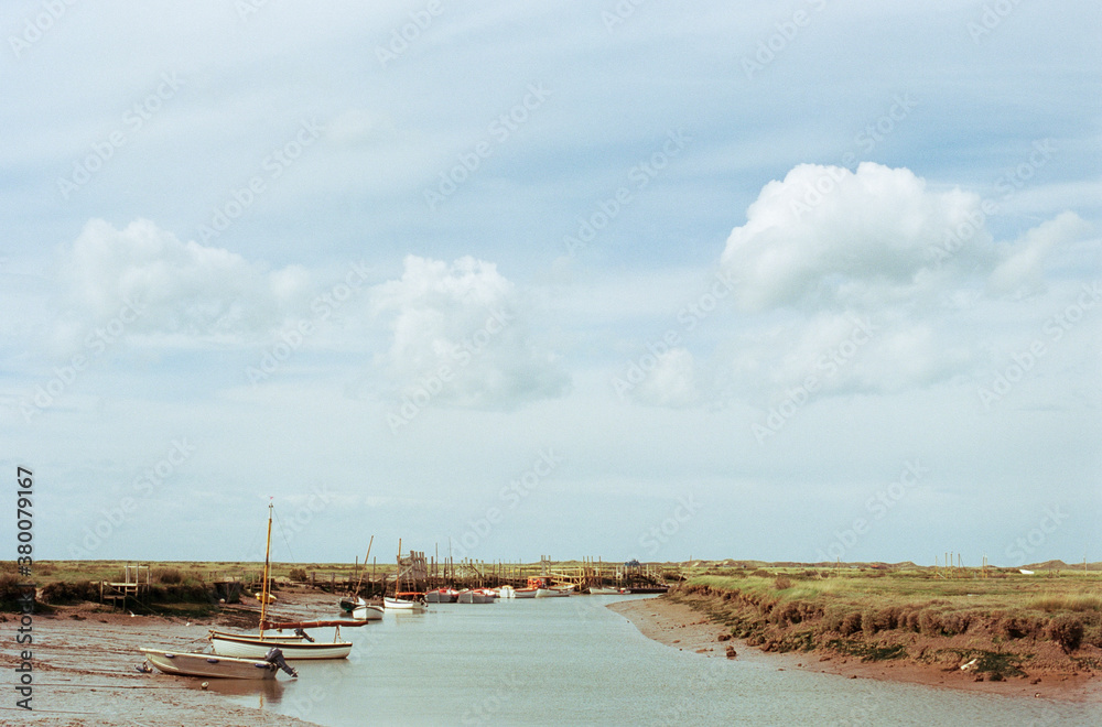 Fishermans sheds and at Brancaster Staithe, Norfolk, UK. Fishermans sheds and at Brancaster Staithe, Norfolk, UK.