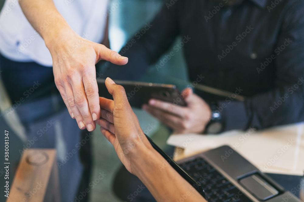 Office: Two Women Shake Hands During Introduction Office: Two Women Shake Hands During Introduction