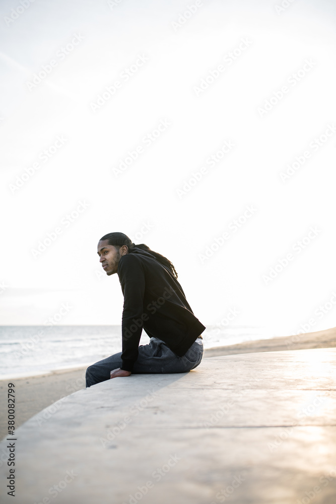 Man enjoying morning on beach. Man enjoying morning on beach.