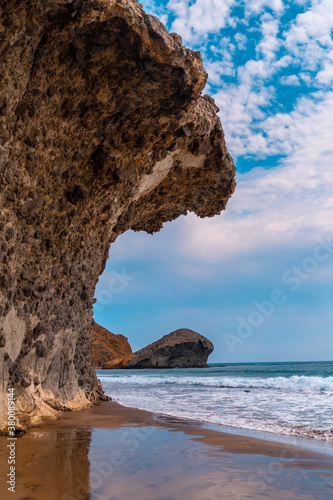 Precious rock walls at Monsul Beach in Cabo de Gata Natural Park, Nijar, Andalucia. Spain, Mediterranean Sea