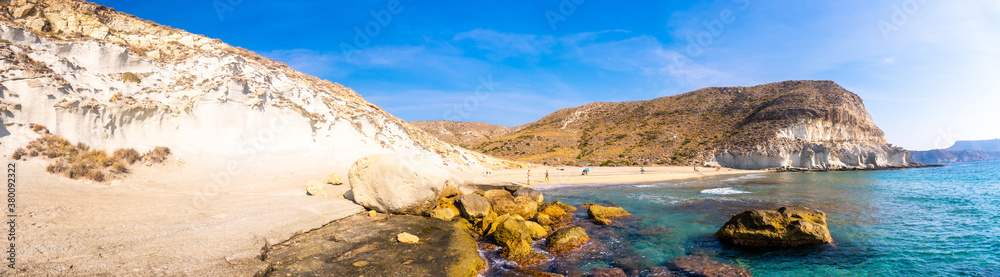 Panoramic view of the gigantic white rock walls in Cala de Enmedio and the sea in the natural park of Cabo de Gata, Nijar, Andalucia. Spain, Mediterranean Sea