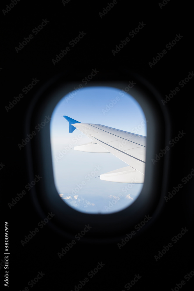 View through an airplane window View through an airplane window