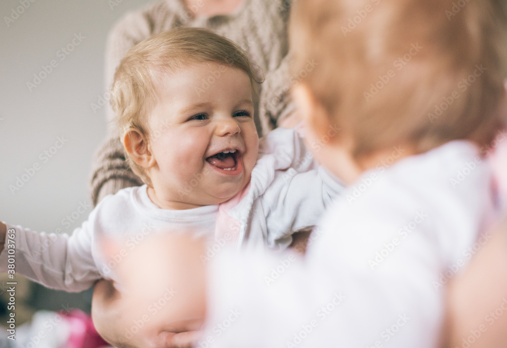 Happy Baby Looking herself in the Mirror Happy Baby Looking herself in the Mirror