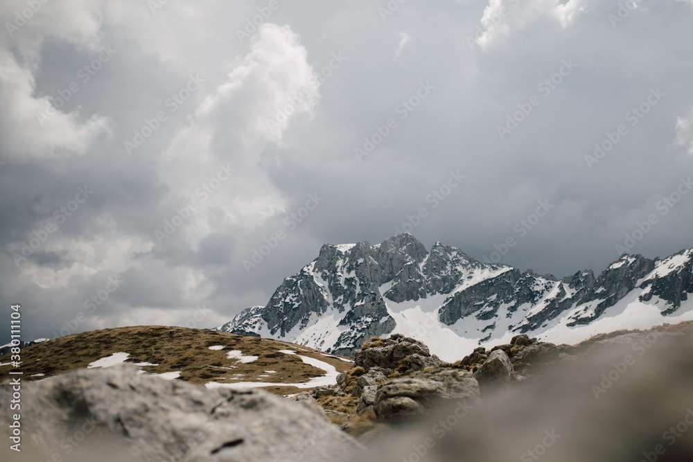Rocky mountain peak covered with snow Rocky mountain peak covered with snow