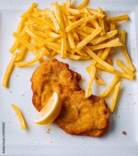 Wiener Schnitzel and french fries photo