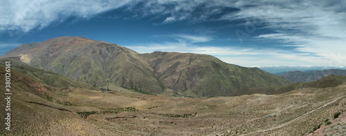 Panoramic of the Andes mountain range. Aerial view of the hills and green meadow of the famous landmark Bishop's slope in Salta, Argentina. © Gonzalo