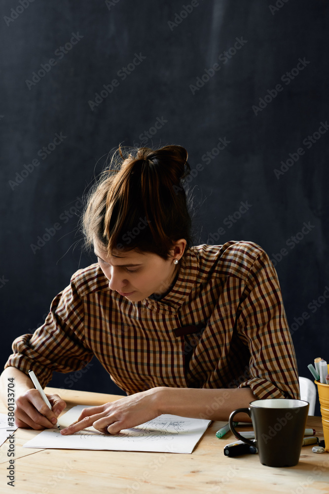 Young woman at drawing class Young woman at drawing class