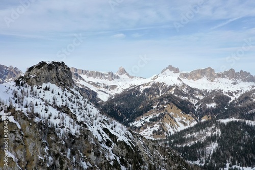 Fototapeta Naklejka Na Ścianę i Meble -  aerial snow covered mountain peaks in alps at winter 