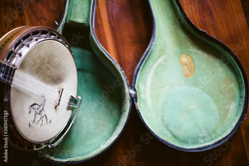 vintage open banjo case with banjo