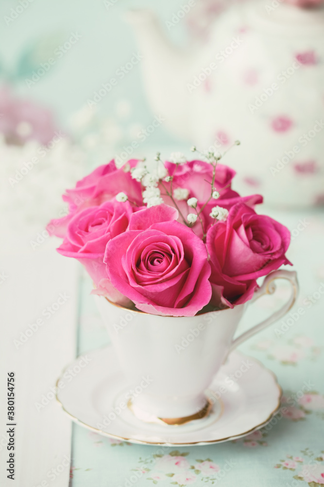 Roses and gypsophila in a teacup Roses and gypsophila in a teacup