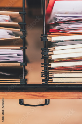 Detail of documents folders inside a folders drawer.
