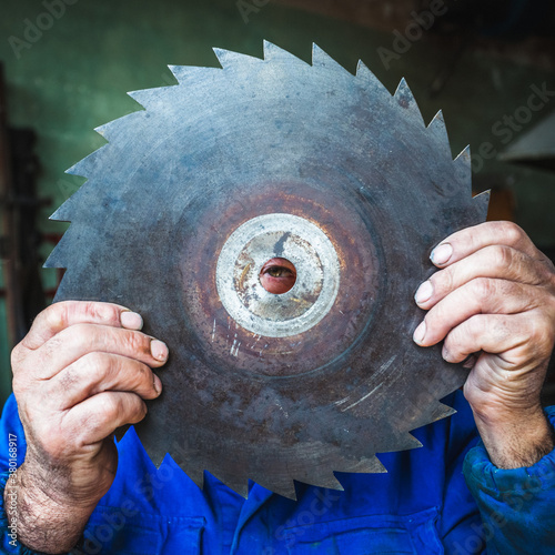 Worker with circular saw