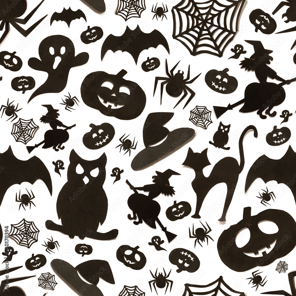 Seamless halloween pattern in cartoon style on white background. Paper art. Happy hallowen holiday concept Seamless halloween pattern in cartoon style on white background. Paper art. Happy hallowen holiday concept