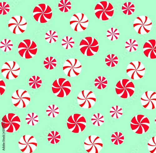 Background with candies. Pattern with round candies. New Year, Christmas, Santa Claus
