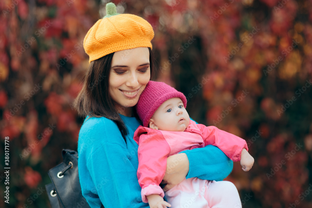 Portrait of a Cute Mother and Child Wearing Knitted Hats Portrait of a Cute Mother and Child Wearing Knitted Hats